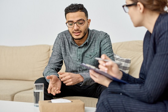 Two people engaged in conversation.
